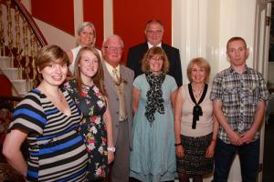 President Ken Melville with the charity  representatives.